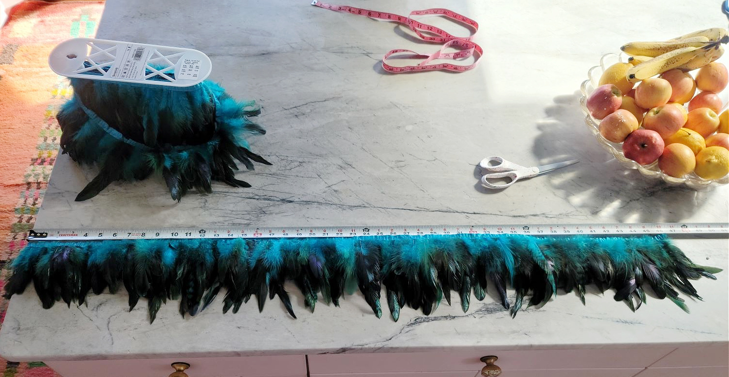 DIY Counter Stools by popular Colorado home design blog, Eclectic Twist: image of blue, black and green feather trim.