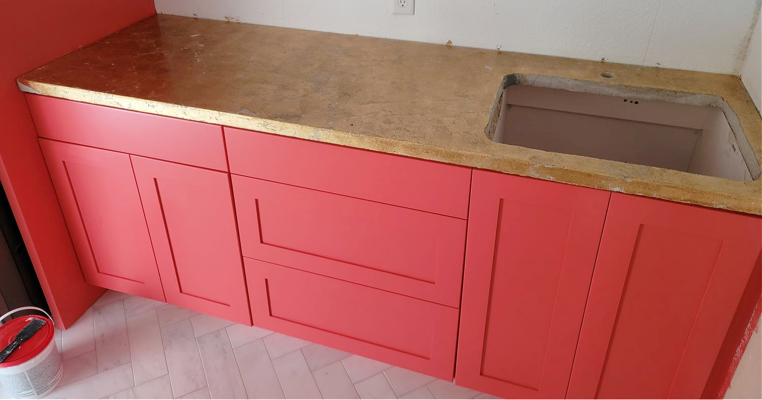 Wallpaper Installation by popular CO home design blog: image of coral pink cabinets. 