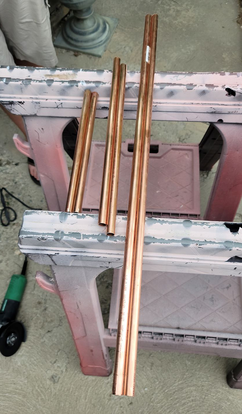 DIY Open Shelving by popular CO home design blog, Eclectic Twist: image of different length copper bars. 