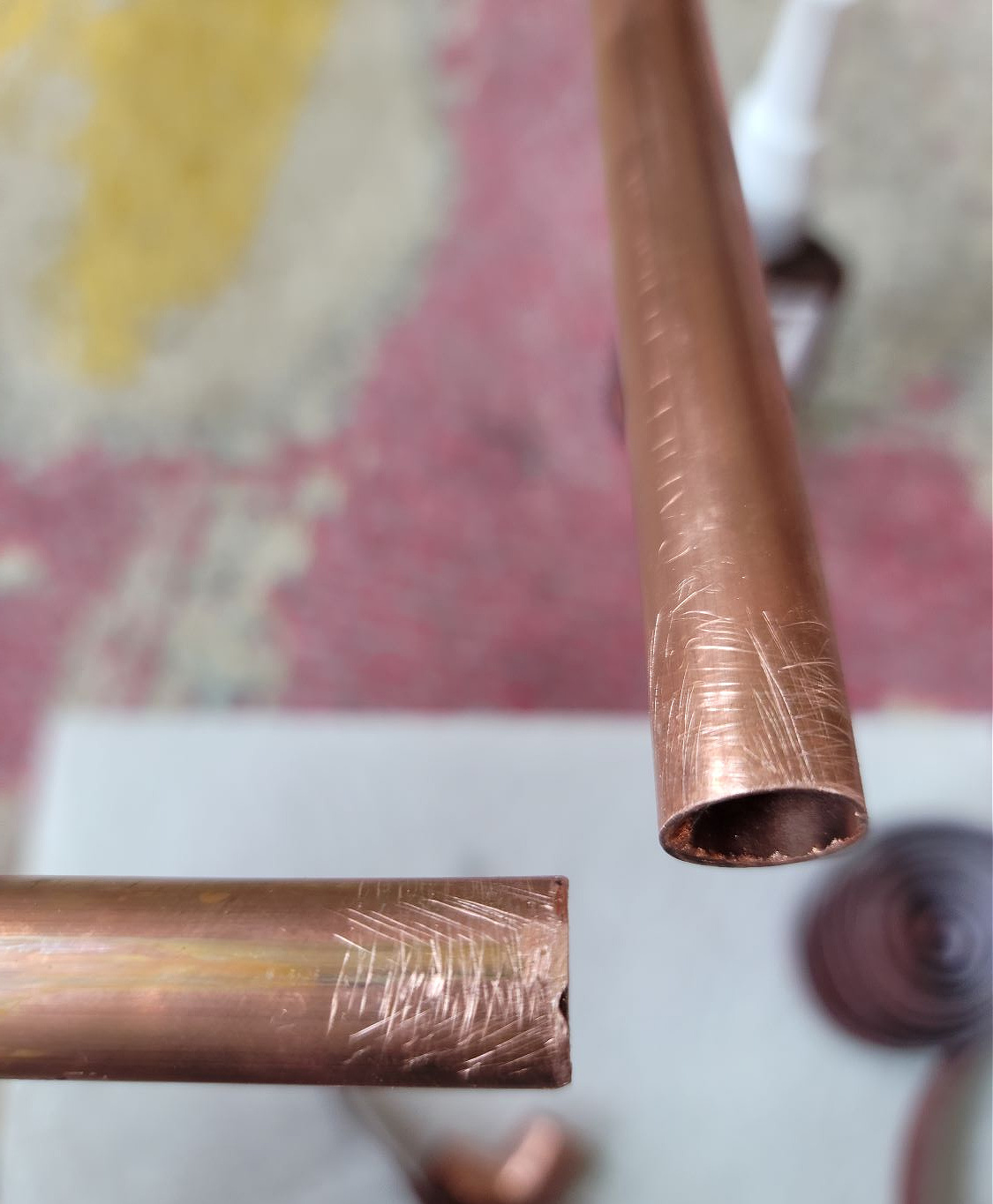 DIY Open Shelving by popular CO home design blog, Eclectic Twist: image of copper bars. 